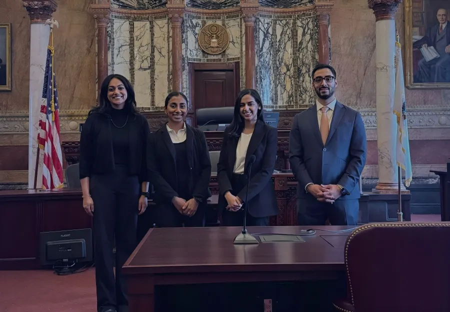 Photo of Shawn Lowe Desai, Ayila Arshad, Sadhna Ramanathan and Aarya Raj in the courtroom