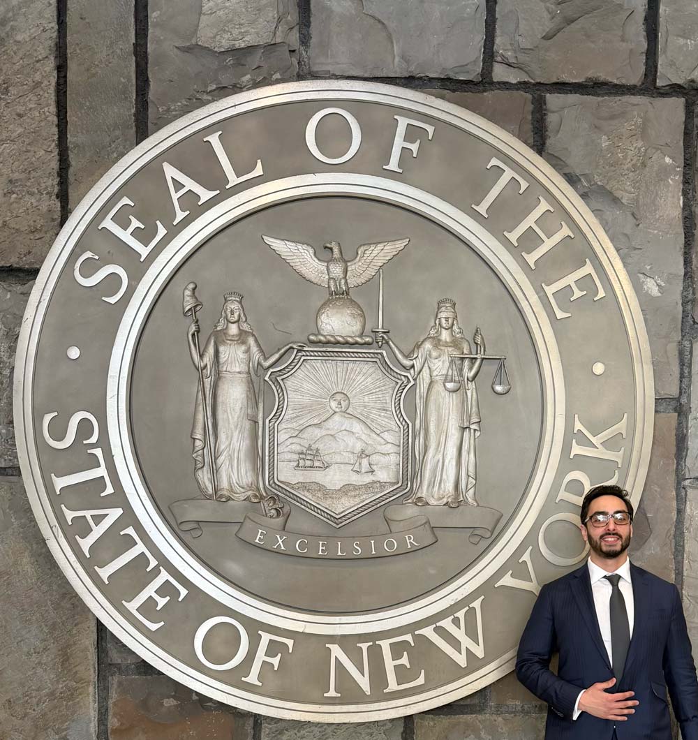 Shawn Lowe Desai with The Great Seal of the State of New York
